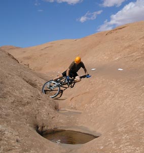 Paul Doherty falls on the slickrock trail