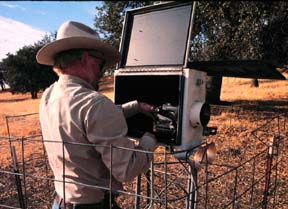 Rich Liechti changes the video cassette in the fault monitor camera