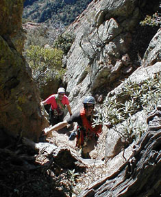 Climbing from Lion's ledge to the base of the climb
