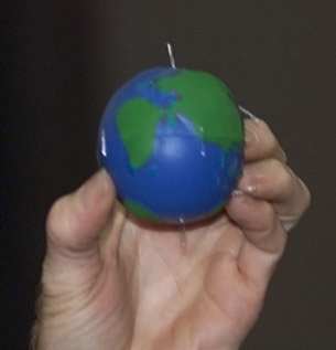 A Sqishy earth with magnet inside.